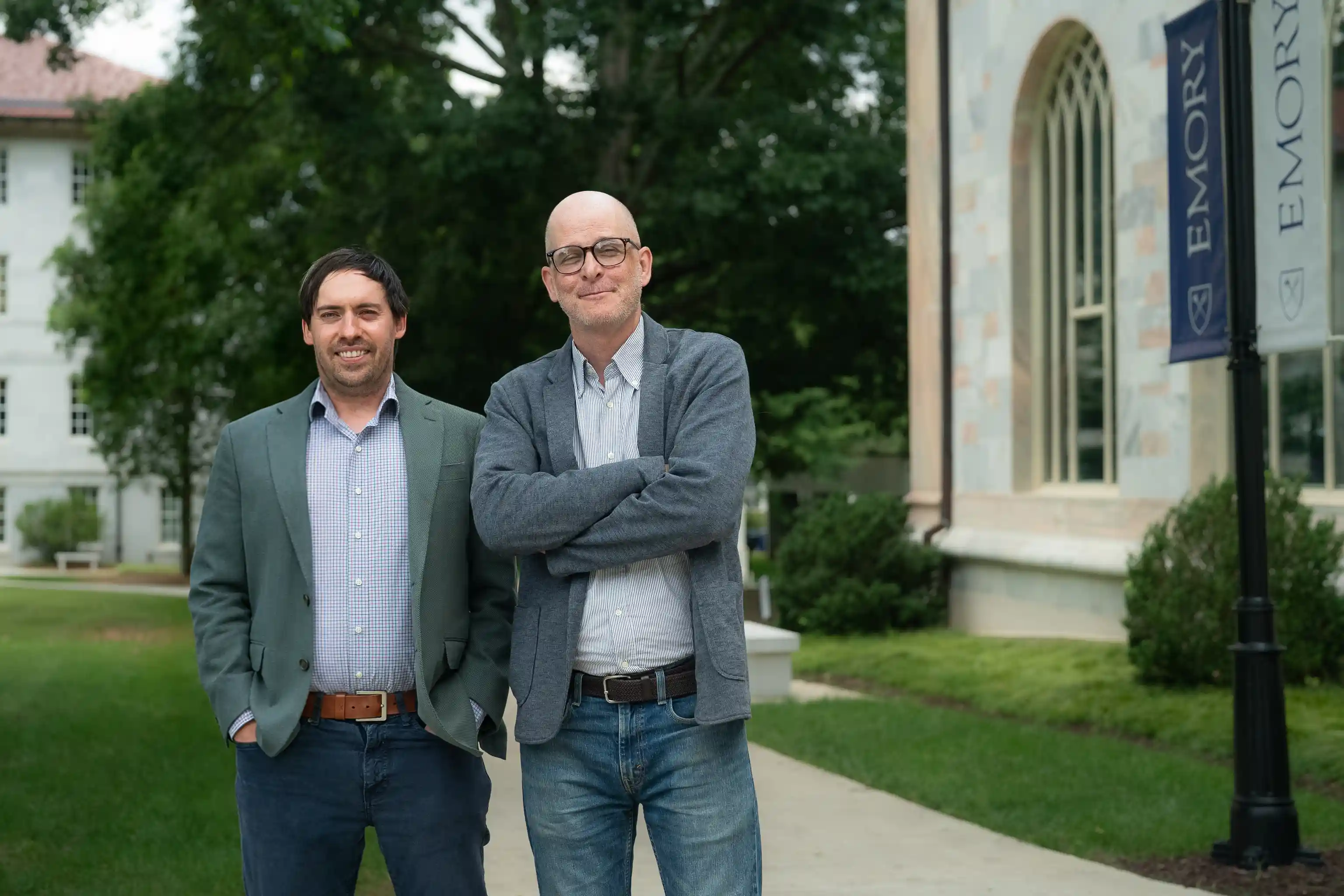 Pablo Montagnes and Zachary Peskowitz stand together on Emory quad